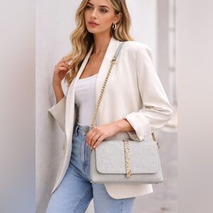 Mario Valentino Light Gray  Color Shoulder Bag With Remivable Adjustable Strups.